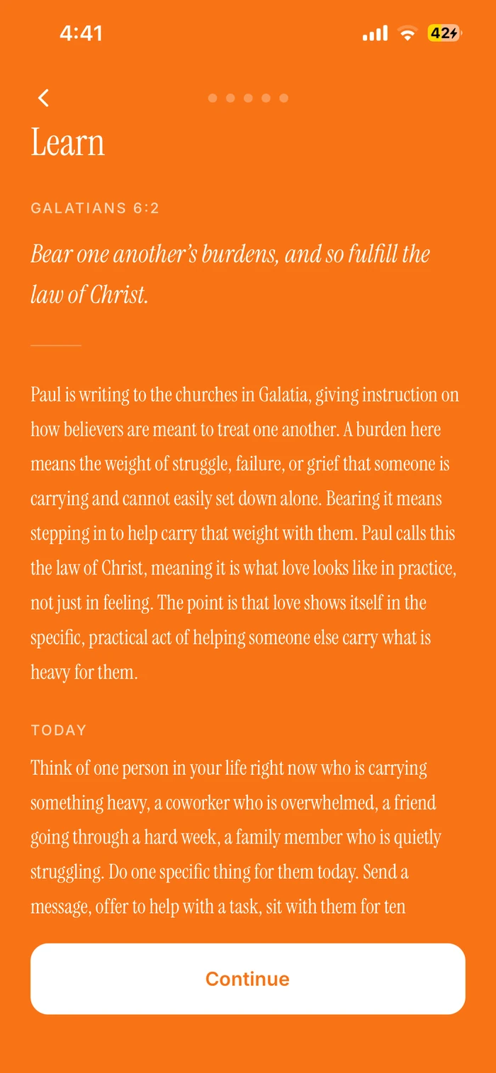 The app open on the day's passage: Galatians 6:2, followed by an explanation of what Paul meant and one thing to do about it today.